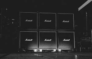 six Marshall speakers stacked ontop of each other
